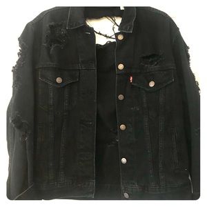 Levi’s distresses trucker denim jacket